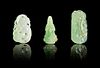 Three Carved Jadeite Pendants Height of tallest 2 1/8 inches.