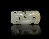 * A Carved White Jade Toggle Height 2 1/2 inches.
