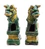 A Pair of Pottery Figures of Temple Lions Height 8 1/2 inches.
