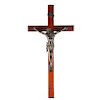 Crucifijo. Siglo XX. Fundición en antimonio patinado, con cruz de madera. Cristo: 43 cm de altura.