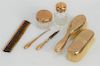 14 karat gold travel set in original leather fitted case, 
including two covered glass jars, two brushes, boot hook, comb, and nail ...