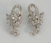 18 karat white gold and diamond earrings, each set with pear shape diamonds, approximately