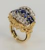 18 karat gold sapphire and diamond ring, set with thirteen blue sapphires, approximately 2 cts., and twenty-two round cut diamonds ...