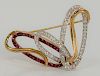 18 karat white and yellow gold brooch, set with diamonds and rubies. 
height 1 1/4 inches, width 2 inches