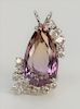 Platinum pendant set with large pear shaped amethyst with five pear shaped diamonds and eight round cut diamonds. 
height 1.25 inches