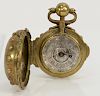 Michel Girard pocket watch having silvered dial with numbers and Roman numerals, 
center engraved with two figures holding a crown, ...