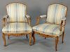 Pair of Louis XV fauteuil having silk upholstery, probably 18th century. height 37 3/4 inches Provenance: Estate from Lloyd Harb...