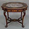 Renaissance Revival center table attributed to Herter Brothers, New York, 
purple inset marble surrounded by geometric inlays with t...