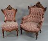 Two Renaissance Revival walnut chairs attributed to John Jelliff,  including a gentleman's chair and a side chair with carved female...