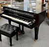 K. Kawai concert grand piano,  manufactured by Kawai Musical Inst. Mfg. Hamamatsu Japan #1857804, having fitted glass top and orig...