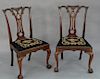 Pair Margolis Chippendale style side chairs, 
with needlepoint seats on ball and claw feet. 
height 38 1/2 inches