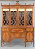 Sacks Federal style custom mahogany breakfront,  two parts, upper section with four glazed doors and eglomise panels set on lower se...