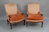 Pair of Louis XV style fauteuil, walnut with custom silk woven upholstery and pillows. 
height 43 inches, width 30 1/2 inches 

Prov...