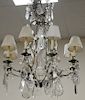 Crystal and brass chandelier, eight light with flat clear crystals. approximate height 40 inches, diameter 32 inches  Provenan...