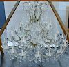 Crystal and brass thirty-seven light chandelier.  height 48 inches, diameter 50 inches