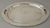 Large oval sterling silver serving tray,  having handles and monogrammed center, marked: sterling 750/87