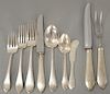 Sterling silver flatware set, setting for twelve, eight-six pieces to include (12) dinner forks, (12) lunch forks, (12) salad forks,...