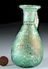 Brilliantly Iridescent Roman Glass Vessel