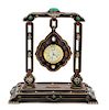An American Enamel and Brass Desk Clock Height 7 x width 6 1/2 x depth 3 inches.