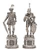 A Pair of German Hanau Silver Knights, 19TH CENTURY, depicting knights in full armor standing on pedestal bases.