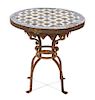 An Addison Mizner Tile Top Iron Side Table Height 20 x diameter 20 1/4 inches.