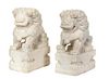A Pair of Chinese Carved White Marble Foo Lions Height 19 1/2 inches.