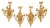 A Set of Four Louis XV Style Gilt Bronze Five-Light Sconces Height 36 x width 19 x depth 13 inches.