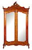 * A Louis XV Style Walnut Armoire Height 88 x width 54 x depth 17 1/2 inches.