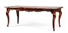 A Louis XV Style Carved Mahogany Dining Table Height 31 1/4 x width 82 x depth 36 3/4 inches.