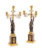 A Pair of Empire Gilt and Patinated Bronze Three-Light Candelabra Height 19 5/8 inches.