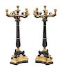 A Pair of Empire Style Gilt and Patinated Bronze Five-Light Candelabra Height 32 x width 13 x depth 11 inches.