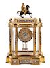 A Champleve Decorated Bronze Mantel Clock Height 17 1/2 inches.