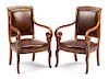 A Pair of Louis Philippe Walnut Fauteuils Height 34 3/4 inches.
