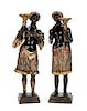 A Pair of Venetian Gilt and Polychromed Figures Height 38 1/2 inches.