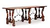 A Spanish Renaissance Revival Iron Mounted Trestle Table Height 32 x width 86 1/4 x depth 31 1/2 inches.