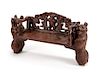 A Black Forest Carved Bench Height 24 x width 45 x depth 15 inches.