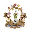 * A Meissen Porcelain Figure on a Gilt Metal Candelabrum Height 10 inches.