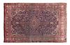 A Kashan Wool Rug 6 feet 5 inches x 4 feet 4 inches.