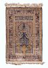 An Indo-Isfahan Silk Prayer Rug 4 feet 10 inches x 3 feet 4 inches.