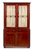 An American Empire Mahogany Bookcase Height 84 x width 49 1/4 x depth 20 1/4 inches.