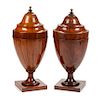 A Pair of George III Mahogany Cutlery Urns Height 25 inches.