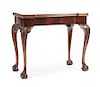 A George III Mahogany Flip-Top Game Table Height 31 x width 36 x depth 18 inches.