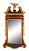 A George III Style Parcel Gilt Mahogany Mirror Height 58 x width 31 inches.