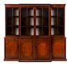 * An English Mahogany Breakfront Bookcase Height 94 x width 103 x depth 23 1/3 inches.