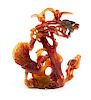 A Chinese Carved Carnelian Figural Group Height 9 1/2 x width 8 inches.