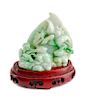 A Burmese Green Jade Figural Group Height 3 1/2 inches.