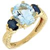 An aquamarine and sapphire 14K yellow gold ring.