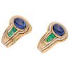 A sapphire and emerald 18K yellow gold pair of earrings.