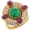 An emerald, ruby and diamond 18K yellow gold ring.