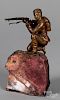 Patinated bronze figure with a rifle